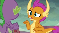 Size: 1920x1080 | Tagged: safe, imported from derpibooru, screencap, smolder, spike, dragon, sweet and smoky, baby, baby dragon, claws, confused, dragon lands, dragoness, duo, fangs, female, folded wings, horns, male, open mouth, raised eyebrow, raised hand, slit eyes, slit pupils, teenaged dragon, teenager, winged spike, wings, worried