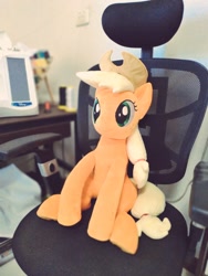 Size: 768x1024 | Tagged: safe, artist:nekokevin, imported from derpibooru, applejack, earth pony, pony, applejack's hat, chair, cowboy hat, female, freckles, hat, irl, mare, photo, plushie, sewing, sitting, smiling, solo