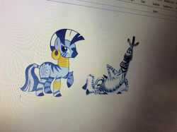 Size: 1280x957 | Tagged: safe, artist:lovetime17, deleted from derpibooru, imported from derpibooru, zecora, zebra, crossover, crossover shipping, female, madagascar, male, marty, photo, picture of a screen, shipping, straight