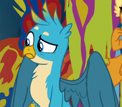 Size: 670x588 | Tagged: safe, imported from derpibooru, screencap, gallus, smolder, griffon, uprooted, cave of harmony, chest fluff, cropped, male, offscreen character, raised eyebrow, solo focus, spread wings, wings