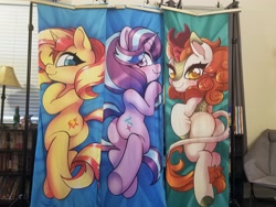 Size: 4032x3024 | Tagged: safe, artist:techycutie, imported from derpibooru, autumn blaze, starlight glimmer, sunset shimmer, kirin, pony, unicorn, equestria girls, body pillow, body pillow design, bunset shimmer, butt, glimmer glutes, irl, looking at you, looking back, looking back at you, photo, plot, smiling