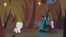 Size: 1280x720 | Tagged: safe, imported from derpibooru, screencap, cozy glow, queen chrysalis, changeling, changeling queen, pegasus, pony, frenemies (episode), duo, female, filly, foal, log, sitting, torch