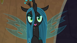 Size: 1920x1080 | Tagged: safe, imported from derpibooru, screencap, queen chrysalis, changeling, changeling queen, frenemies (episode), crown, evil lair, eyeshadow, fangs, female, former queen chrysalis, grogar's lair, insect wings, jewelry, lair, makeup, quadrupedal, regalia, slit eyes, slit pupils, solo, spread wings, wings
