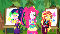 Size: 1916x1080 | Tagged: safe, imported from derpibooru, screencap, pinkie pie, sci-twi, sunset shimmer, twilight sparkle, equestria girls, equestria girls series, sunset's backstage pass!, spoiler:eqg series (season 2), canvas, easel, female, geode of sugar bombs, geode of telekinesis, magical geodes, messy, messy hair, outdoors, paint, painting, ponytail, sunset shimmer is not amused, trio, trio female, unamused