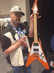 Size: 1024x1365 | Tagged: safe, imported from derpibooru, rainbow dash, human, bronycon, brony, community related, dustykatt, glasses, guitar, hat, irl, irl human, minifig, musical instrument, photo