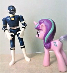 Size: 960x1052 | Tagged: safe, artist:dex stewart, imported from derpibooru, starlight glimmer, human, pony, unicorn, bandai, butt, female, glimmer glutes, irl, photo, plot, power rangers, power rangers turbo, toy, turbo a power rangers movie