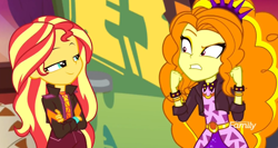 Size: 1920x1020 | Tagged: safe, imported from derpibooru, screencap, adagio dazzle, sunset shimmer, equestria girls, equestria girls series, sunset's backstage pass!, spoiler:eqg series (season 2), angry, discovery family logo, duo, duo female, female, smiling, smirk, smug, smugset shimmer, spiked wristband, wristband