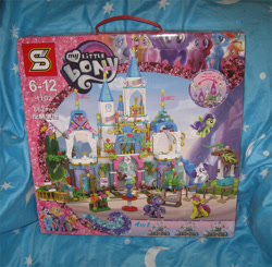 Size: 713x700 | Tagged: safe, artist:heckyeahponyscans, imported from derpibooru, applejack, fluttershy, pinkie pie, rainbow dash, rarity, spike, twilight sparkle, alicorn, pegasus, pony, unicorn, bootleg, bootleg lego, box, irl, my little lony, photo, toy, twilight sparkle (alicorn)