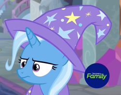 Size: 1096x862 | Tagged: safe, imported from derpibooru, screencap, trixie, pony, unicorn, a horse shoe-in, cape, clothes, cropped, discovery family logo, female, hat, mare, solo, trixie is not amused, trixie's cape, trixie's hat, unamused