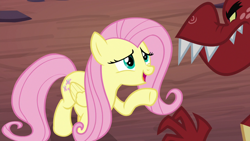 Size: 1280x720 | Tagged: safe, imported from derpibooru, screencap, fluttershy, garble, pegasus, pony, sweet and smoky, female, mare, raised hoof, solo focus