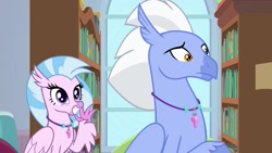 Size: 1920x1080 | Tagged: safe, imported from derpibooru, screencap, silverstream, sky beak, classical hippogriff, hippogriff, a horse shoe-in, bookshelf, claws, confused, cute, diastreamies, duo, father and daughter, female, frown, grin, jewelry, male, necklace, pearl necklace, raised eyebrow, smiling, talons, teenager, waving