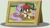 Size: 1024x581 | Tagged: dead source, safe, artist:grumppanda, artist:loveedovey, imported from derpibooru, oc, oc only, oc:alizarin fruits, pony, female, filly, mare, photo, prone, simple background, story included