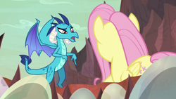 Size: 1920x1080 | Tagged: safe, imported from derpibooru, screencap, fluttershy, princess ember, dragon, pegasus, pony, sweet and smoky, dragon egg, dragoness, duo, egg, female, mare, pointing