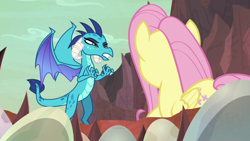 Size: 1920x1080 | Tagged: safe, imported from derpibooru, screencap, fluttershy, princess ember, dragon, pegasus, pony, sweet and smoky, dragon egg, dragoness, duo, female, mare, narrowed eyes