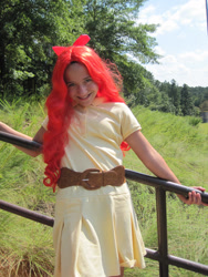 Size: 1200x1600 | Tagged: safe, artist:enchantedtopaz, imported from derpibooru, photographer:enchantedtopaz, apple bloom, human, clothes, cosplay, costume, female, fence, ichibancon, irl, irl human, leaning, photo, smiling