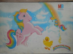 Size: 1019x752 | Tagged: safe, imported from derpibooru, parasol (g1), sunlight (g1), bird, duck, bow, cloud, cute, milton bradley, official, parasawwl, puzzle, rain, rainbow, sunlightbetes, tail bow