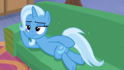 Size: 1280x720 | Tagged: safe, imported from derpibooru, screencap, trixie, pony, road to friendship, couch, draw me like one of your french girls, on side, side, smiling, solo, stupid sexy trixie