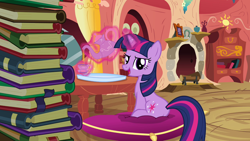 Size: 1280x720 | Tagged: safe, imported from derpibooru, screencap, twilight sparkle, pony, unicorn, spike at your service, book, cup, female, golden oaks library, mare, pillow, solo, teacup, teapot, unicorn twilight