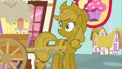 Size: 1366x768 | Tagged: safe, imported from derpibooru, screencap, applejack, earth pony, pony, apple family reunion, season 3, cart, covered, female, glitter, golden applejack, luster dust, mare, ponyville, shiny, solo, sugarcube corner, surprised, wide eyes