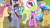 Size: 1280x720 | Tagged: safe, imported from derpibooru, screencap, cherry berry, diamond cutter, dizzy twister, lavender bloom, orange swirl, parasol, quantum leap (character), rainbowshine, roseluck, sunshower raindrops, written script, earth pony, pony, unicorn, fame and misfortune, anti-rarity sign, background pony, bowtie, female, glasses, male, mare, ponyville, protest, quantum leap, quantum leap (tv series), smiling, smirk, stallion