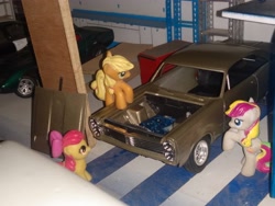 Size: 4160x3120 | Tagged: safe, imported from derpibooru, apple bloom, applejack, coconut cream, blind bag, chevrolet corvette, everfree customs, ford crown victoria police interceptor, garage, mercury comet, tool chest, toy, trailer, workbench