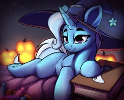 Size: 1836x1483 | Tagged: safe, artist:hitbass, imported from derpibooru, trixie, pony, unicorn, book, candy, female, food, halloween, hat, holiday, jack-o-lantern, lying down, mare, prone, pumpkin, solo, witch hat