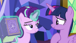 Size: 1280x720 | Tagged: safe, imported from derpibooru, screencap, starlight glimmer, twilight sparkle, alicorn, pony, the beginning of the end, bags under eyes, book, duo, duo female, female, folded wings, frown, lidded eyes, magic, mare, smiling, smug, telekinesis, twilight sparkle (alicorn), wings