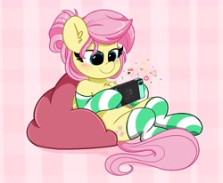 Size: 4096x3372 | Tagged: safe, artist:kittyrosie, imported from derpibooru, fluttershy, pegasus, pony, alternate hairstyle, blushing, chest fluff, clothes, cute, ear fluff, female, gamershy, hair bun, high res, isabelle (animal crossing), mare, nintendo switch, playing, shyabetes, sitting, socks, solo, striped socks
