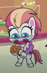 Size: 205x318 | Tagged: safe, imported from derpibooru, screencap, darling dish, earth pony, pony, death of a sales-pony, my little pony: pony life, spoiler:pony life s01e08, bipedal, cookie, female, food, g4.5, mare, smiling, zesty