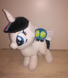 Size: 1080x1243 | Tagged: safe, artist:rxndxm.artist, imported from derpibooru, oc, oc only, parasprite, pony, unicorn, duo, eyelashes, horn, irl, photo, plushie, riding, unicorn oc