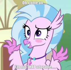 Size: 613x600 | Tagged: safe, edit, edited screencap, imported from derpibooru, screencap, silverstream, hippogriff, uprooted, blatant lies, blushing, caption, cute, cutest hippogriff alive, diastreamies, i'm not cute, image macro, jewelry, liar, meme, necklace, smiling, solo, text