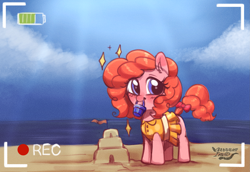 Size: 2615x1802 | Tagged: safe, artist:opossum_imoto, imported from derpibooru, oc, oc only, oc:peachy keen, earth pony, pony, beach, blushing, clothes, cute, dress, female, filly, happy, looking at you, mouth hold, not pinkie pie, ocbetes, ocean, proud, recording, sandcastle, signature, smiling, solo, water