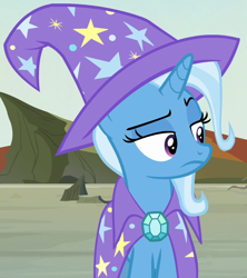 Size: 894x1006 | Tagged: safe, imported from derpibooru, screencap, trixie, pony, unicorn, to change a changeling, cape, clothes, cropped, hat, trixie is not amused, trixie's cape, trixie's hat, unamused