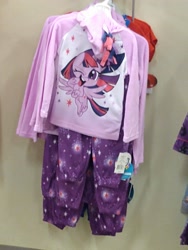 Size: 3120x4160 | Tagged: safe, imported from derpibooru, twilight sparkle, alicorn, pony, my little pony: pony life, clothes, g4.5, irl, long sleeved shirt, looking at you, merchandise, one eye closed, photo, sleepwear, solo, store, target demographic, twilight sparkle (alicorn), wink, winking at you