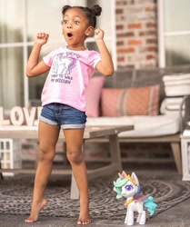 Size: 1080x1289 | Tagged: safe, imported from derpibooru, princess celestia, human, unicorn, my little pony: pony life, advertisement, barefoot, clothes, feet, g4.5, instagram, irl, irl human, official, photo, shirt, target demographic, toy