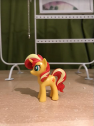 Size: 385x513 | Tagged: safe, imported from derpibooru, sunset shimmer, pony, unicorn, cutie mark, doll, female, figurine, mare, photo, shadow, solo, sun, toy
