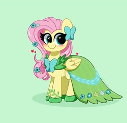 Size: 3200x3100 | Tagged: safe, artist:kittyrosie, imported from derpibooru, fluttershy, pegasus, pony, blushing, clothes, cute, dress, female, flower, flower in hair, gala dress, green background, green eyes, heart, looking at you, mare, shyabetes, simple background, smiling, solo