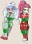 Size: 641x893 | Tagged: safe, artist:nivek15, edit, editor:thomasfan45, imported from derpibooru, sour sweet, sugarcoat, human, equestria girls, 2 girls, annoyed, arm behind back, bondage, bound and gagged, bow, button, christmas, cloth gag, clothes, cropped, cute, duo, duo female, female, femsub, fetish, footed sleeper, footie pajamas, gag, gift wrapped, glasses, help us, holiday, looking at you, onesie, otn gag, over the nose gag, pajamas, pigtails, ponytail, ribbon, sitting, sleepwear, sour sweet is not amused, soursub, submissive, sugarsub, tied up, twintails