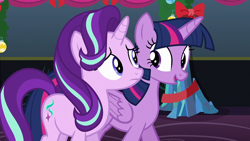 Size: 1920x1080 | Tagged: safe, imported from derpibooru, screencap, starlight glimmer, twilight sparkle, alicorn, pony, unicorn, a hearth's warming tail, bow, female, folded wings, frown, looking at each other, mare, twilight sparkle (alicorn), wings