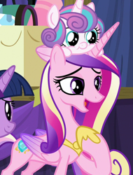 Size: 962x1269 | Tagged: safe, imported from derpibooru, screencap, princess cadance, princess flurry heart, twilight sparkle, alicorn, pony, road to friendship, baby, baby pony, cropped, duo focus, female, flurry heart riding cadance, folded wings, mare, mother and child, mother and daughter, ponies riding ponies, pony hat, riding, stage, wings