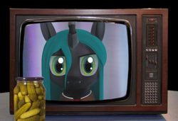 Size: 2560x1752 | Tagged: artist needed, source needed, safe, imported from derpibooru, queen chrysalis, pony, 3d, food, irl, looking at you, photo, pickle, solo, television