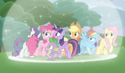 Size: 717x420 | Tagged: safe, imported from derpibooru, screencap, applejack, fluttershy, pinkie pie, rainbow dash, rarity, spike, twilight sparkle, alicorn, dragon, pony, the ending of the end, cropped, female, group, magic, male, mane seven, mane six, shield, smiling, twilight sparkle (alicorn), winged spike, wings