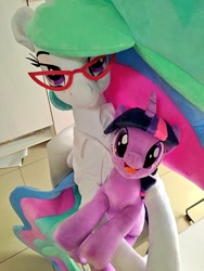 Size: 768x1024 | Tagged: safe, artist:nekokevin, imported from derpibooru, princess celestia, twilight sparkle, alicorn, pony, unicorn, chair, clothes, duo, female, glasses, irl, lidded eyes, looking at you, mare, open mouth, photo, plushie, shirt, sitting, size difference, smiling, teacher and student, unicorn twilight