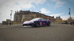 Size: 1920x1080 | Tagged: safe, imported from derpibooru, twilight sparkle, equestria girls, car, castle, city, day, edinburgh, forza horizon, forza horizon 4, game screencap, itasha, mclaren, mclaren 570s, mclaren 650s