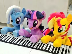 Size: 1024x768 | Tagged: safe, artist:nekokevin, imported from derpibooru, sunset shimmer, trixie, twilight sparkle, pony, unicorn, female, irl, keyboard, magical trio, mare, open mouth, photo, plushie, sitting, smiling, trio, underhoof, unicorn twilight