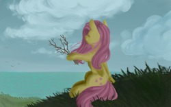 Size: 3200x2000 | Tagged: safe, artist:taika403, imported from derpibooru, fluttershy, pegasus, pony, cloud, eyes closed, facing away, female, folded wings, grass, hoof hold, mare, ocean, outdoors, peaceful, scenery, sitting, sky, solo, stick, twig, wind, windswept mane, wings