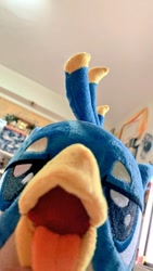 Size: 576x1024 | Tagged: safe, artist:nekokevin, imported from derpibooru, gallus, griffon, beak, birb, close-up, cute, gallabetes, irl, lidded eyes, looking at you, male, maw, mawshot, open mouth, photo, plushie, solo, teenager, tongue out