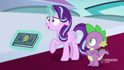 Size: 1280x720 | Tagged: safe, imported from derpibooru, screencap, spike, starlight glimmer, dragon, pony, unicorn, memories and more, spoiler:memories and more, spoiler:mlp friendship is forever, 9now, book, crossed arms, levitation, magic, magic aura, scrapbook, telekinesis, throne room, winged spike, wings