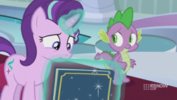 Size: 1280x720 | Tagged: safe, imported from derpibooru, screencap, spike, starlight glimmer, dragon, pony, unicorn, memories and more, spoiler:memories and more, spoiler:mlp friendship is forever, 9now, book, duo, levitation, magic, magic aura, scrapbook, telekinesis, winged spike, wings, worried