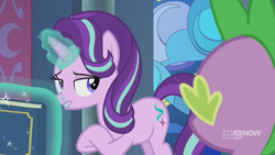 Size: 1280x720 | Tagged: safe, imported from derpibooru, screencap, spike, starlight glimmer, dragon, pony, unicorn, memories and more, spoiler:memories and more, spoiler:mlp friendship is forever, 9now, bedroom eyes, book, duo, levitation, lip bite, looking at each other, magic, magic aura, scrapbook, telekinesis, winged spike, wings